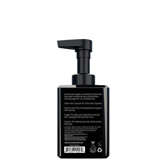 Black skincare product bottle with pump on a white background